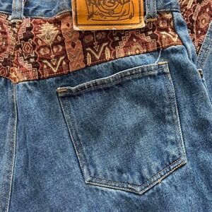 Vintage Appeal high-waisted denim jeans with unique patchwork design